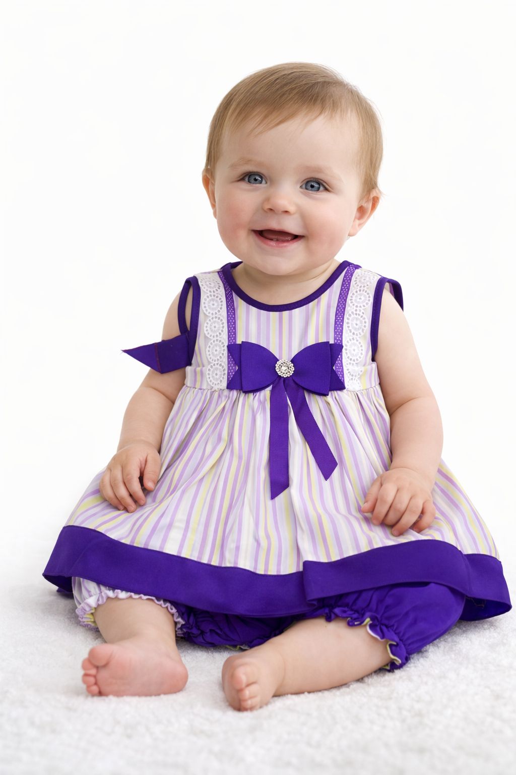 VESTIDO SIN MANGAS ESTAMPADO RAYAS CON MOÑO EN CINTURA INCLUYE CALZÓN