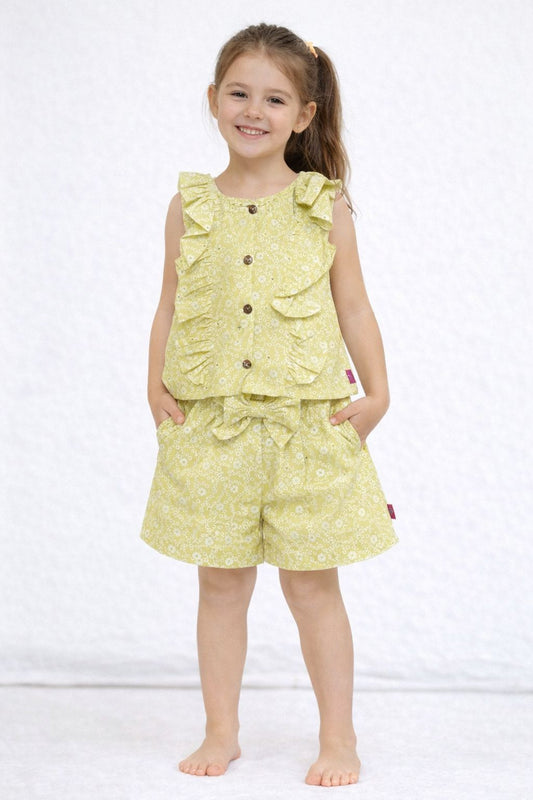 CONJUNTO NIÑA 2P CON BLUSA Y SHORT DETALLES DE OLANES Y MOÑOS